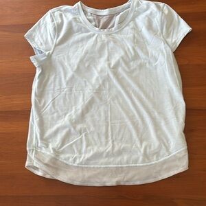 Athleta Girl light blue tee. Girls Size 12 L